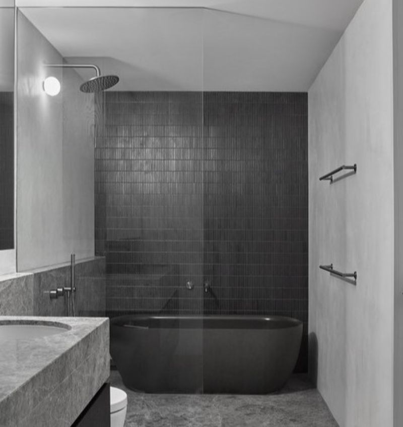 Badrumsrenovering med nytt värmegolv & microcement som ytskikt. Åkersberga, Söra i Stockholm
